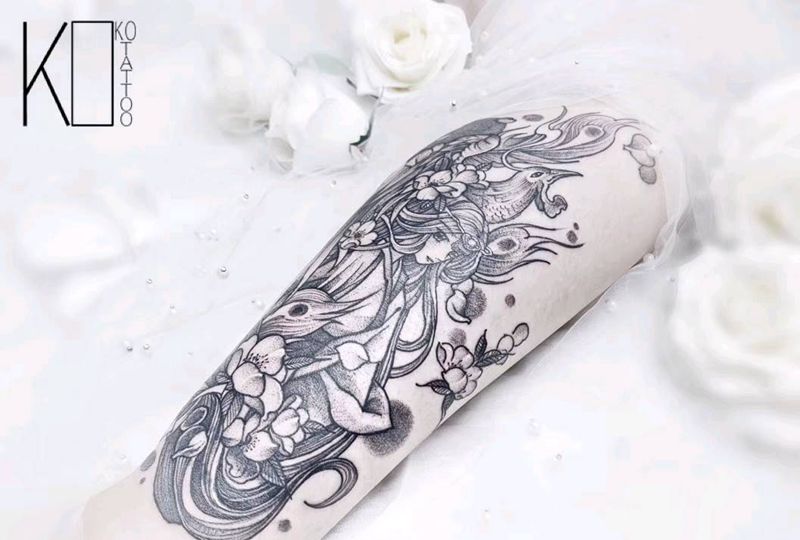 凤凰少女纹身图片_腿部点刺凤凰少女遮盖纹身图案