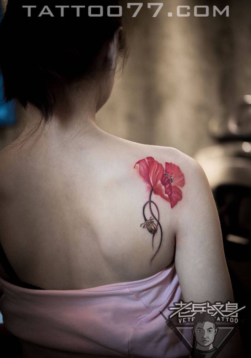 罂粟花纹身作品纹身图片_成品背部清新植物纹身图案