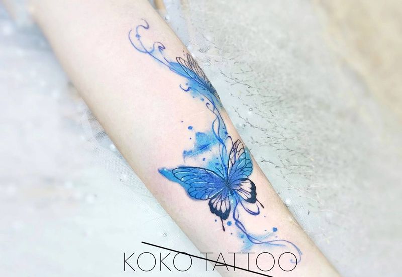 蝴蝶纹身图片_手臂水彩伤疤遮盖水彩蝴蝶手臂纹身图案