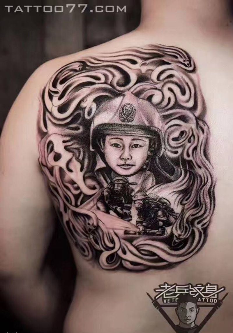 消防员纹身作品纹身图片_成品背部肖像纹身图案