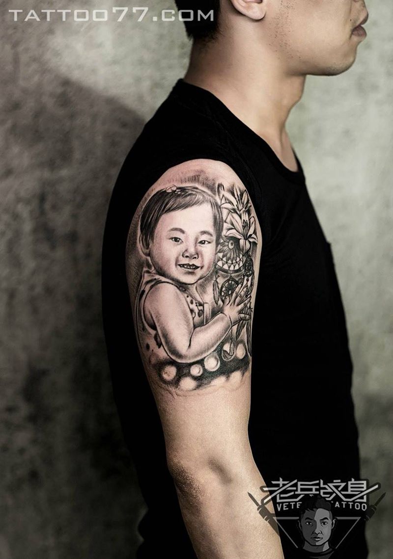 宝宝照片纹身作品纹身图片_成品手臂肖像人物纹身图案