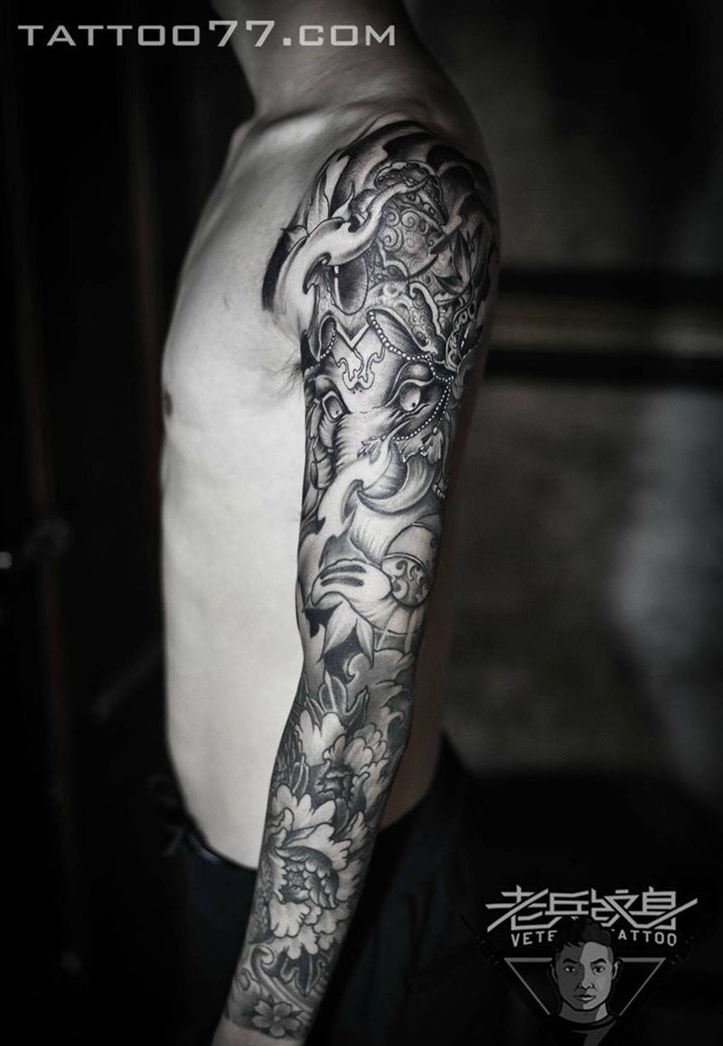 花臂象神牡丹纹身作品纹身图片_成品手臂传统鬼神纹身图案