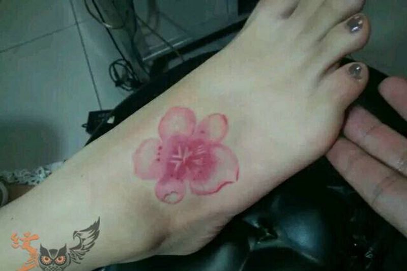 一朵小发纹身图片