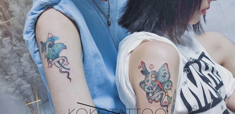 情侣图纹身图片_手臂肩部新传统水彩情侣水彩大臂纹身图案