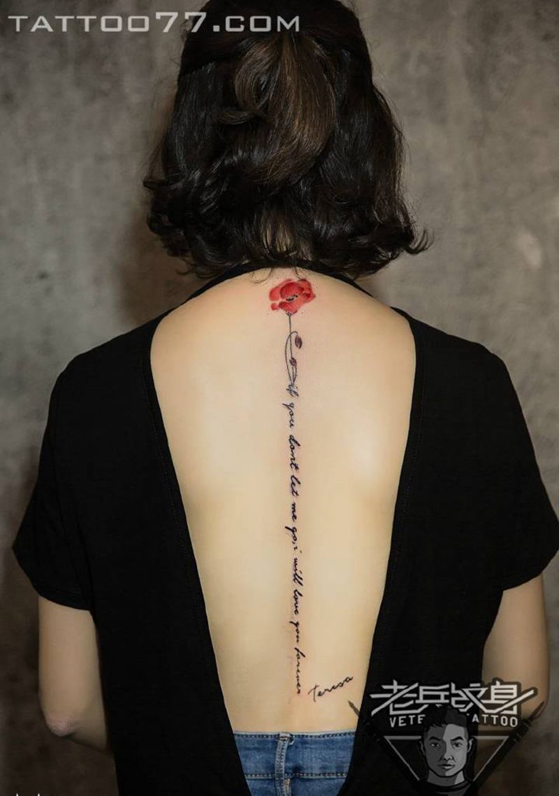 后背脊椎字母纹身作品纹身图片_成品背部欧美植物字符纹身图案