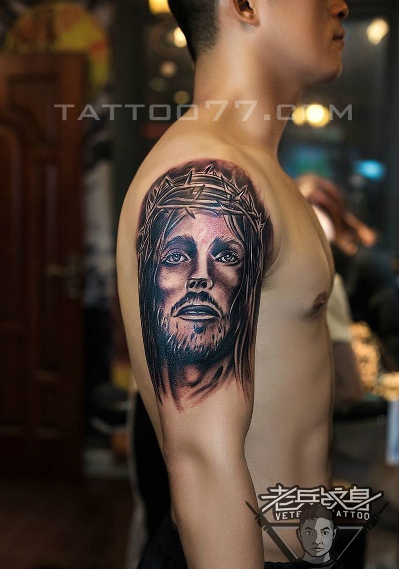 大臂耶稣蝴蝶结纹身作品纹身图片_成品手臂欧美清新人物图腾纹身图案