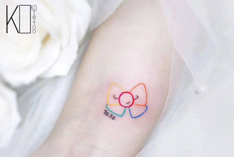 蝴蝶结纹身图片_手臂水彩一人一图简约小图定制设计纹身图案