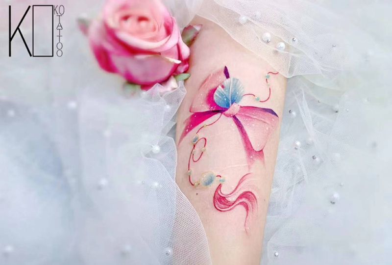 蝴蝶结——遮盖纹身图片_手臂水彩蝴蝶结遮盖设计定制设计纹身图案