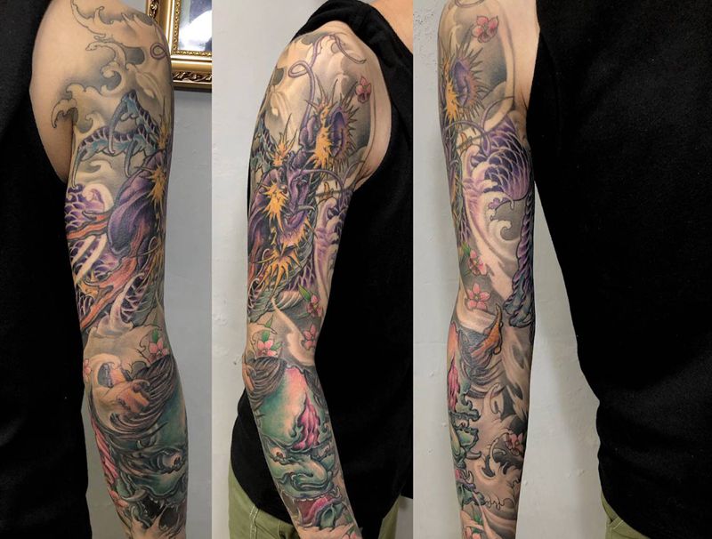 新传统花臂纹身图片_手臂手部新传统龙般若纹身图案