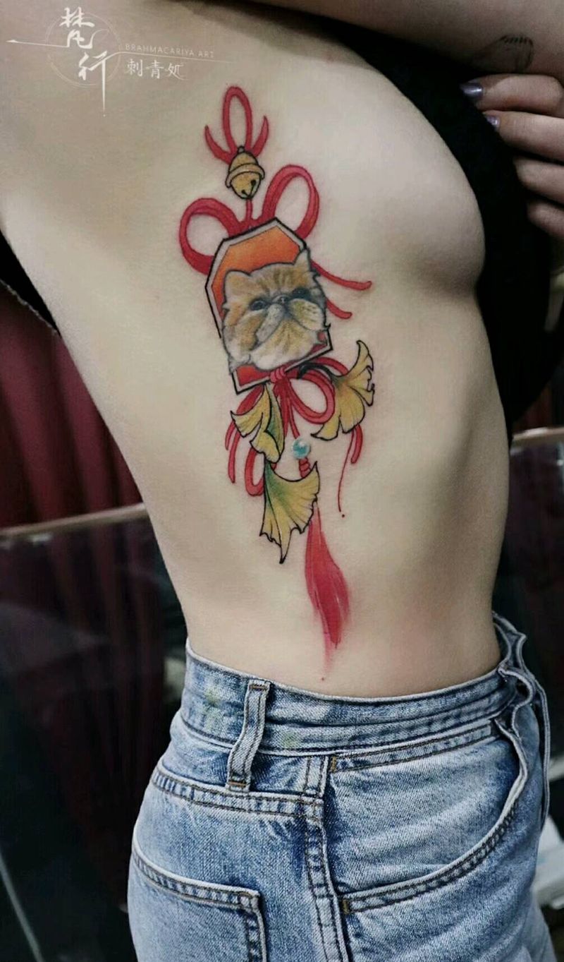 添加纹身图片_腰部新传统老传统猫中国结纹身图案