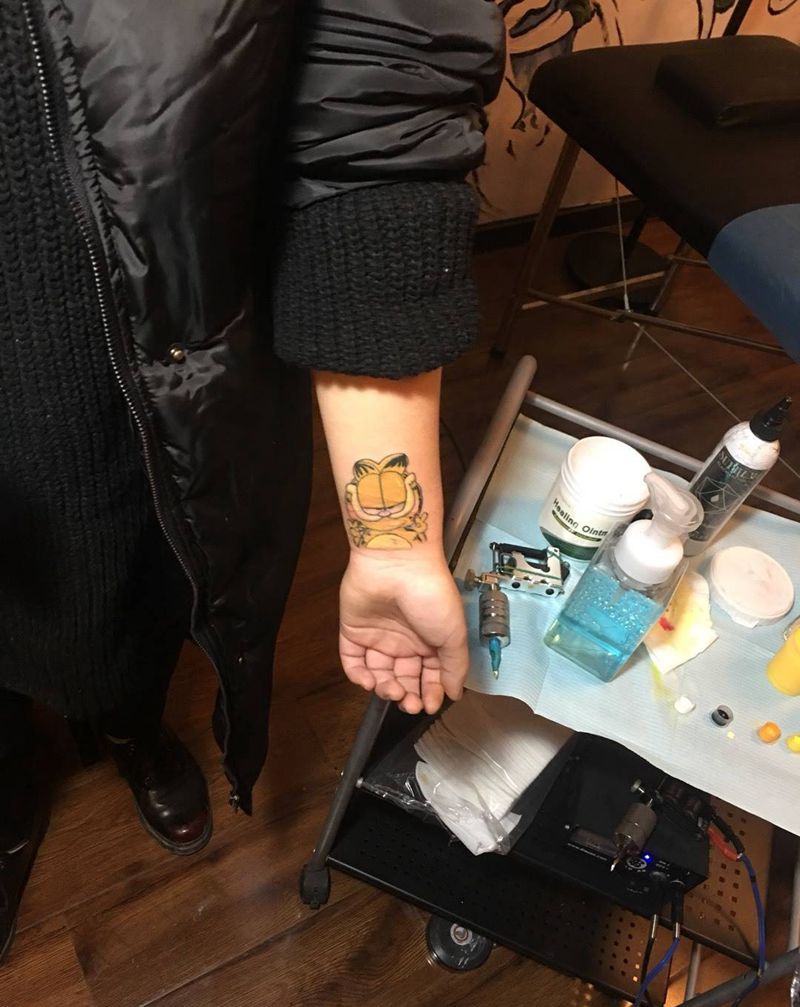 加菲猫遮盖纹身图片