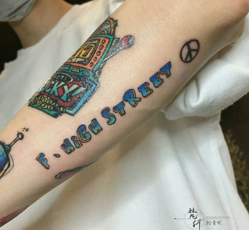 外文纹身图片_手臂水彩纹身图案