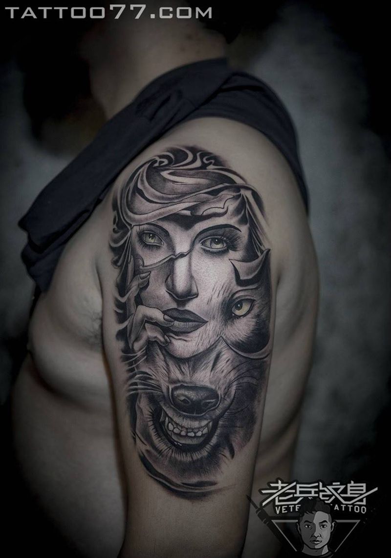 大臂狼美女纹身作品纹身图片_成品手臂欧美肖像动物人物纹身图案