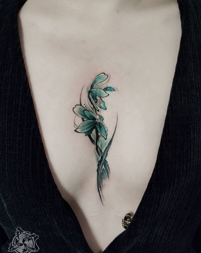 兰花遮盖纹身图片_胸部水彩水墨遮盖国风水彩纹身图案