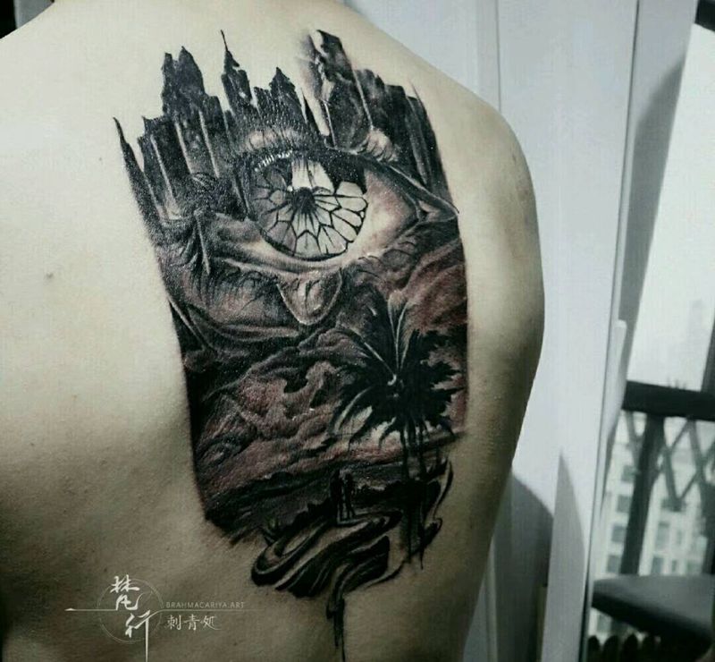 浪漫的沙滩纹身图片_背部水墨老传统纹身图案