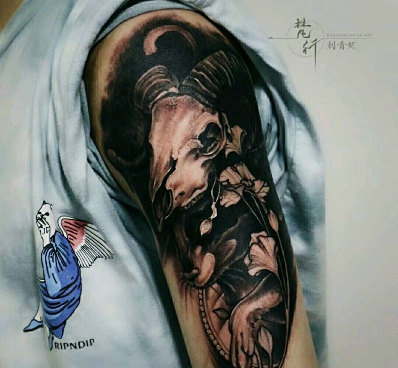羊骨纹身图片_手臂老传统水墨兔子羊骨纹身图案