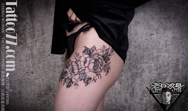 大腿花卉纹身作品纹身图片