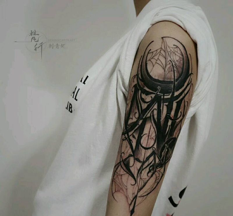 花体字纹身图片_手臂新传统花体字蜘蛛网纹身图案