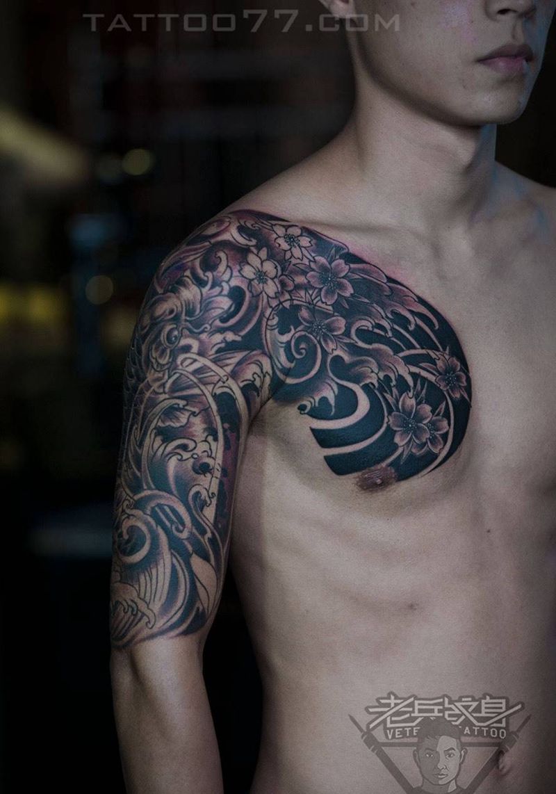 传统半胛鲤鱼纹身作品纹身图片_成品手臂传统动物纹身图案