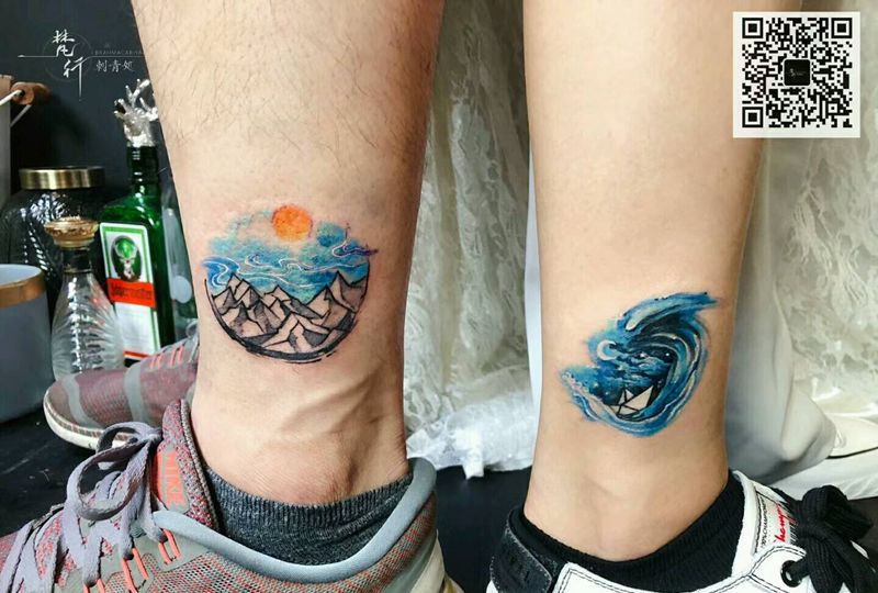 山川日月纹身图片_腿部新传统水彩山川日月纹身图案