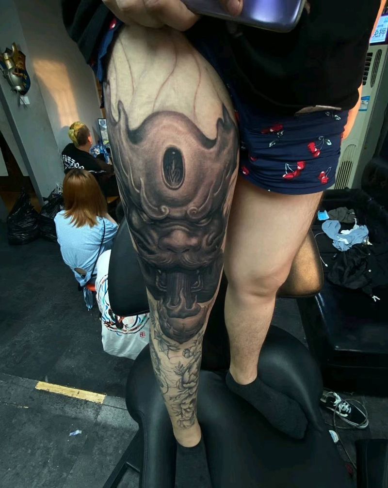 石雕龙全腿遮盖小腿纹身图片_腿部石雕龙纹身图案