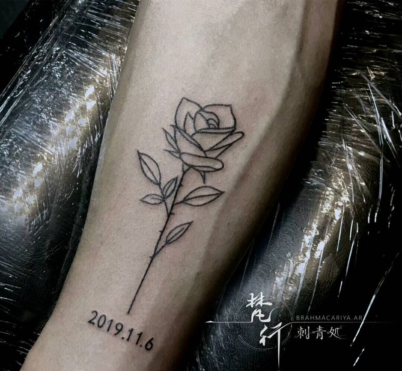 花纹身图片_手臂新传统花数字纹身图案