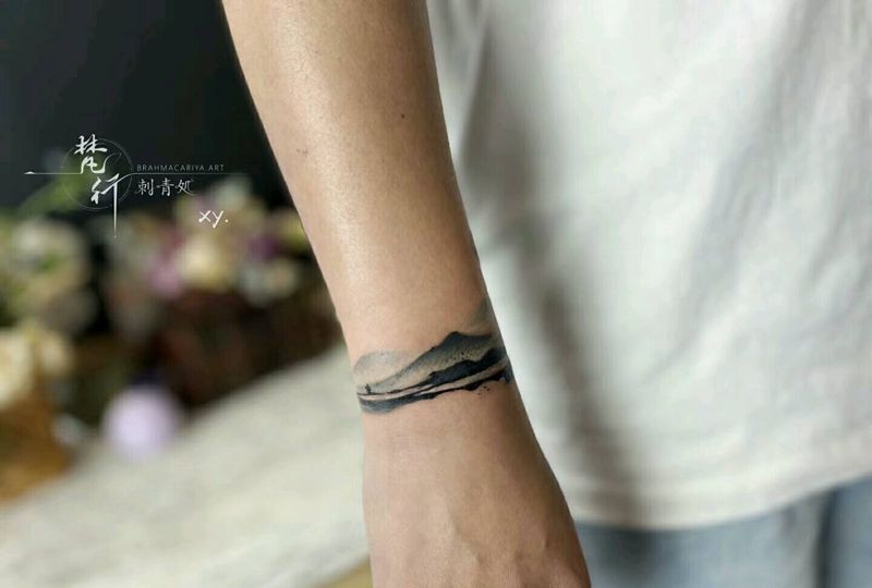 遮盖纹身图片_手臂水墨山水纹身图案