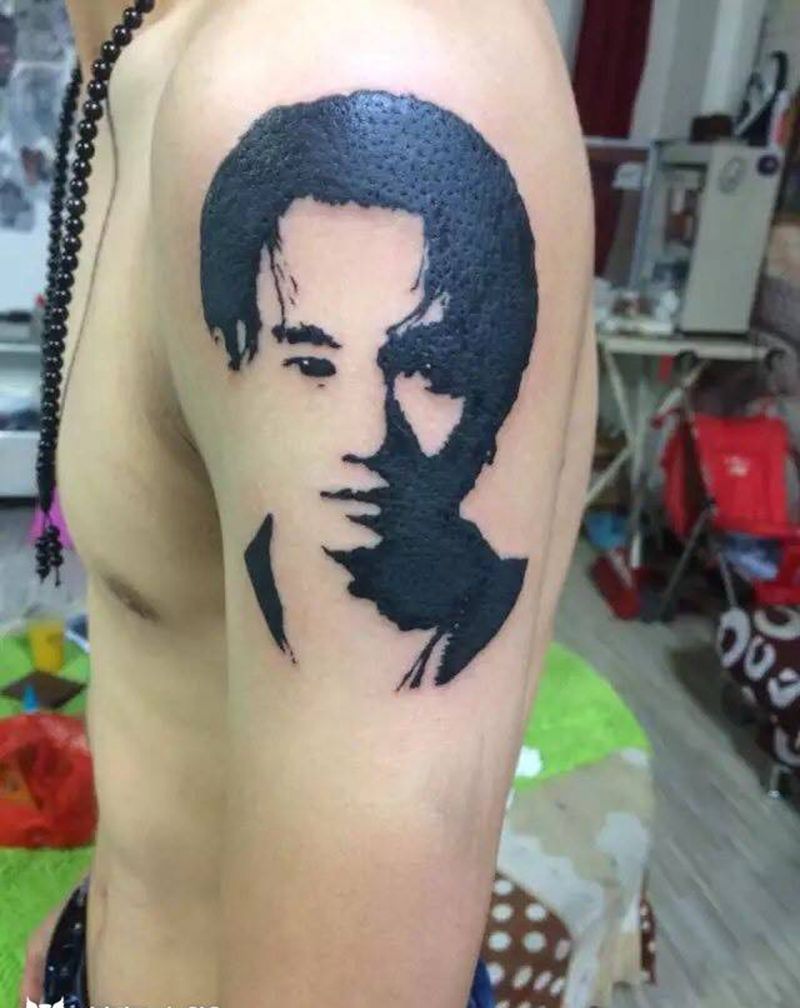 黄家驹纹身图片