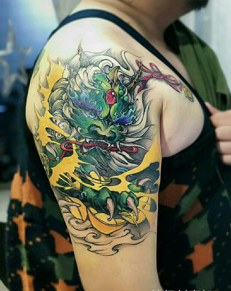 麒麟送子纹身图片_手臂新传统麒麟纹身图案