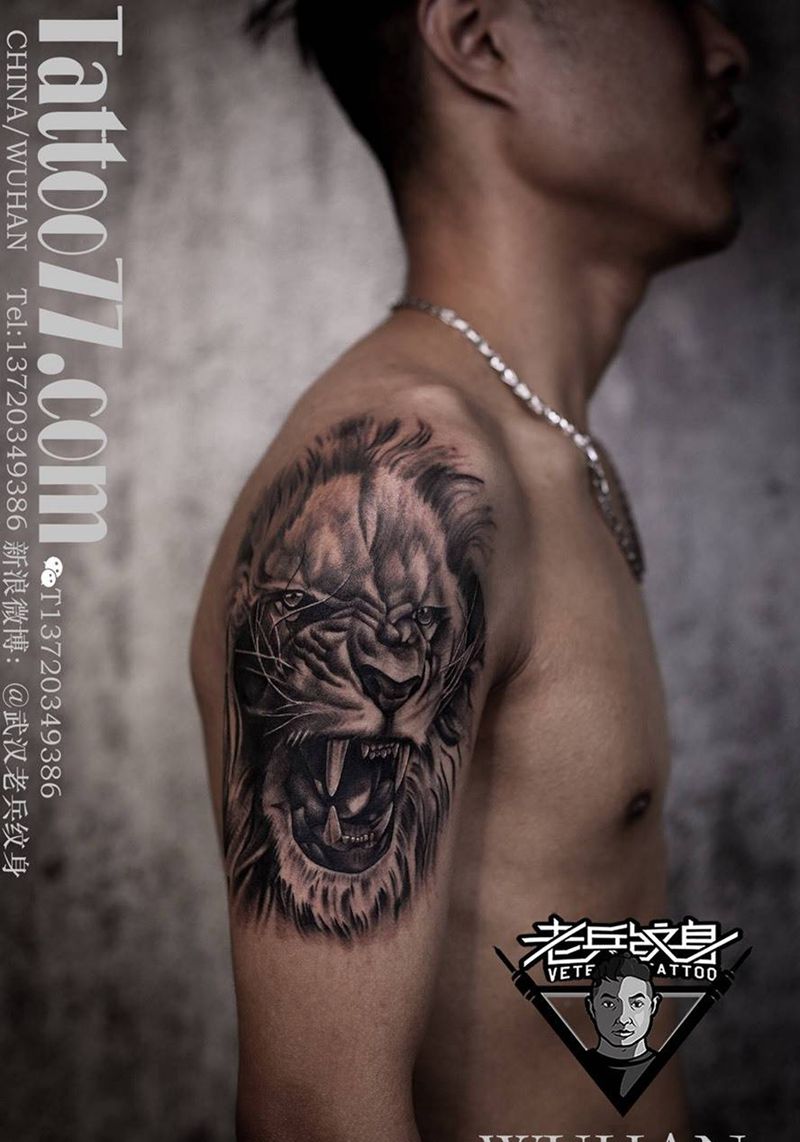 大臂狮子纹身作品纹身图片_成品手臂欧美动物纹身图案