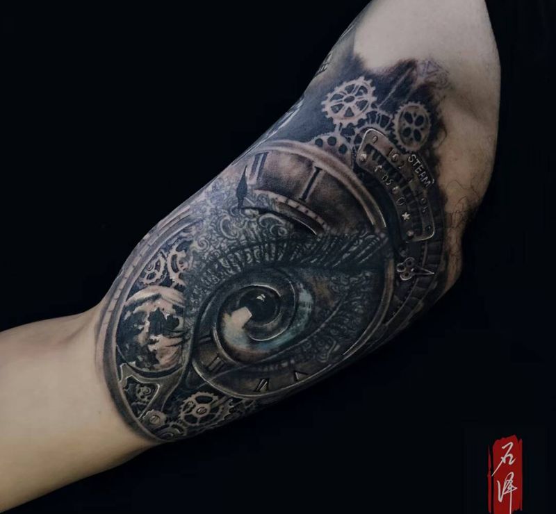 添加修改纹身图片_手臂欧美写实眼睛齿轮纹身图案