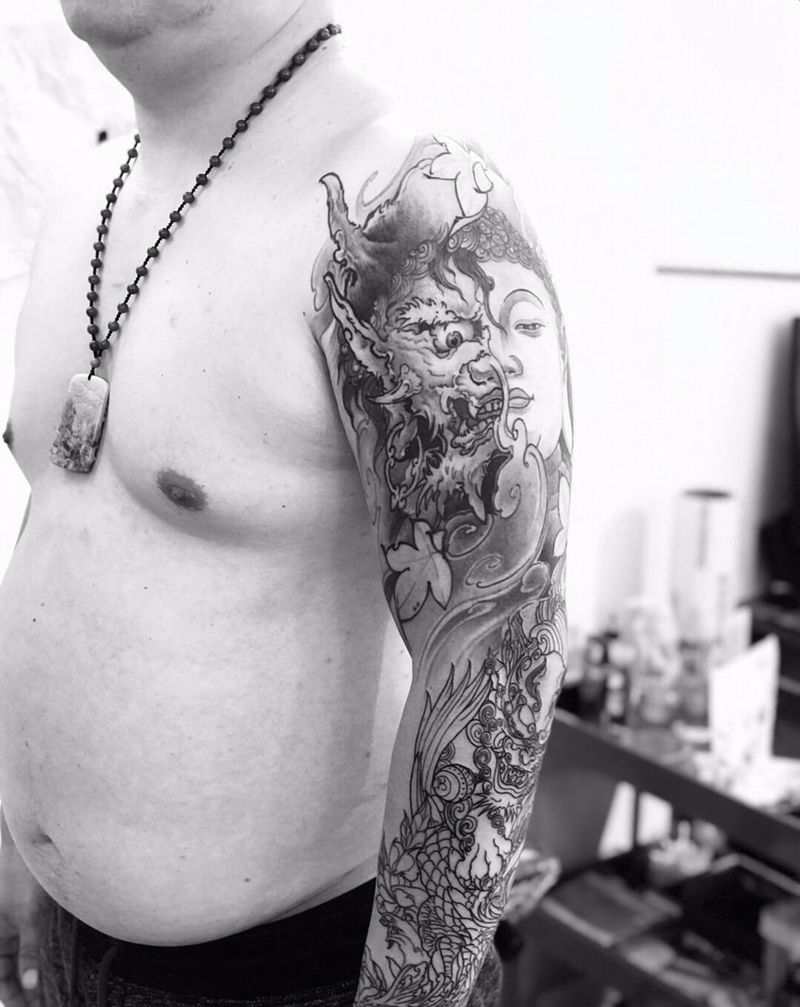 佛魔一念之间花臂纹身图片_手臂新传统一念纹身图案