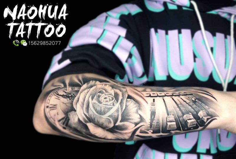 DJ/设计纹身图片_手臂欧美写实纹身图案