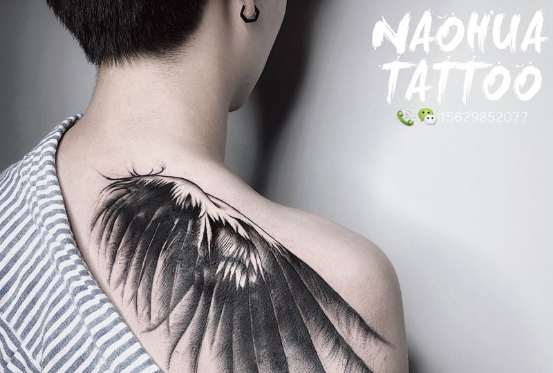 遮盖翅膀/设计纹身图片_背部点刺图腾纹身图案
