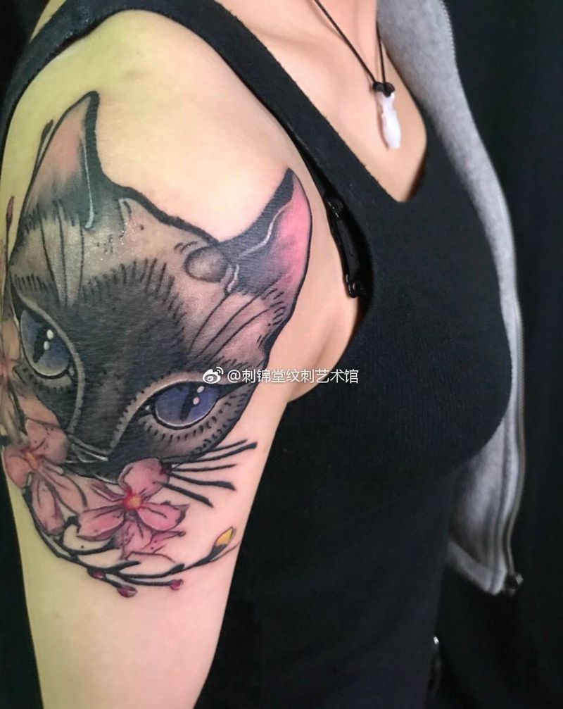 今天刺青#乐手的shcool 纹身# #她家的猫#纹身图片