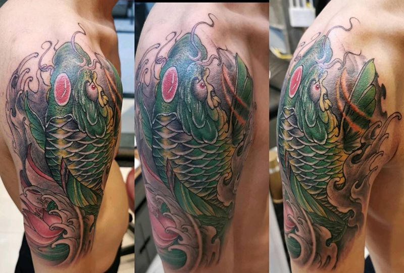 鲤鱼遮盖纹身图片_手臂新传统纹身图案