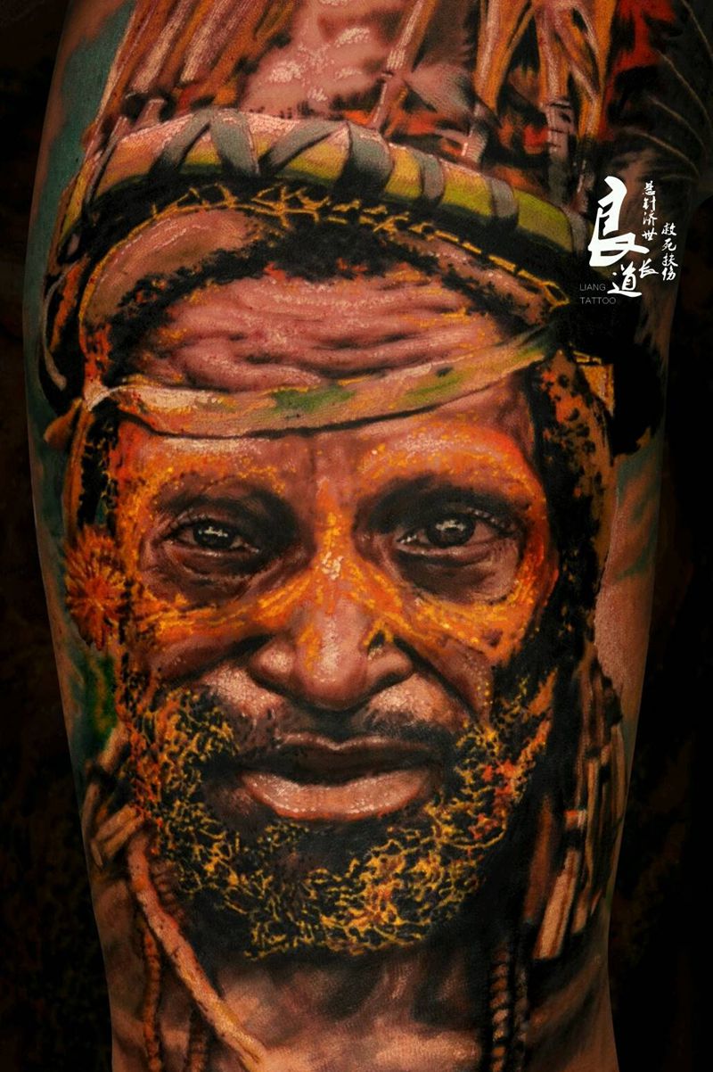 野人纹身图片_手臂欧美写实纹身图案