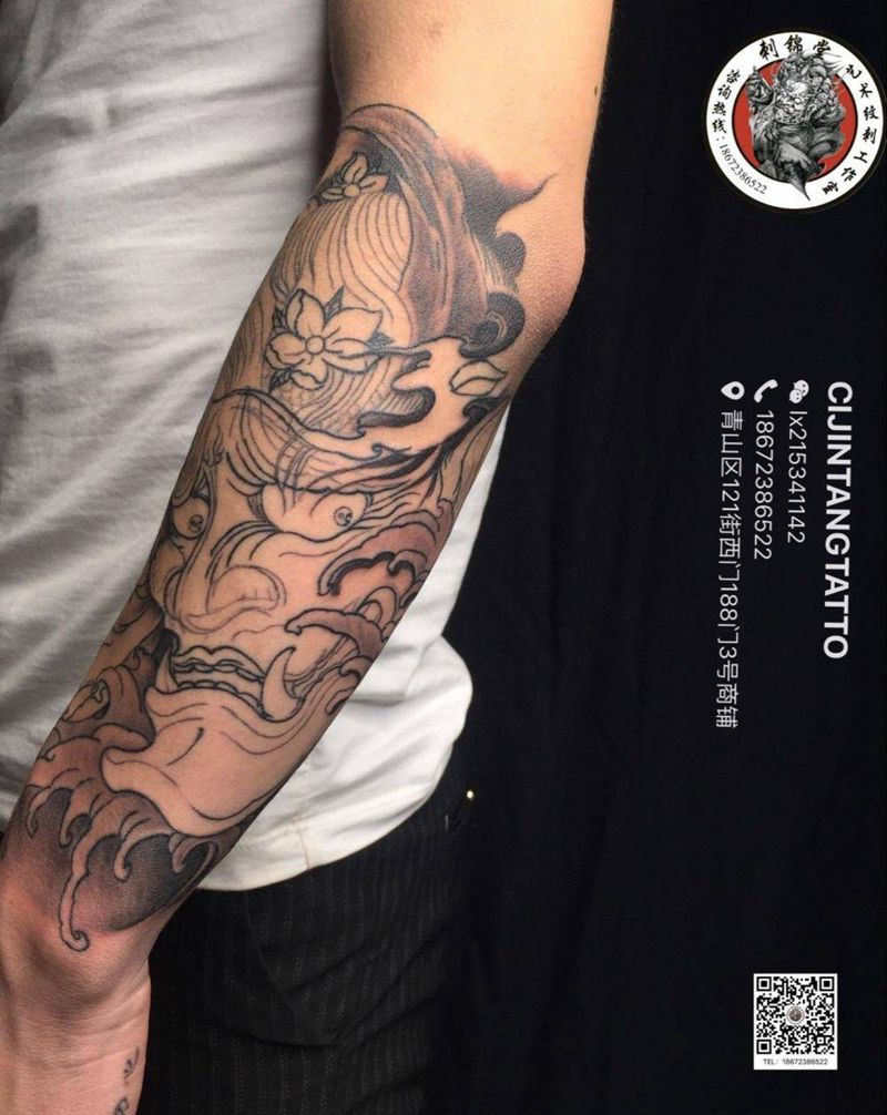 今日刺青欣赏：包小臂进度中纹身图片