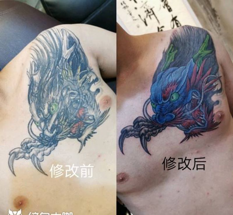 一个龙头修改纹身图片_胸部老传统纹身图案