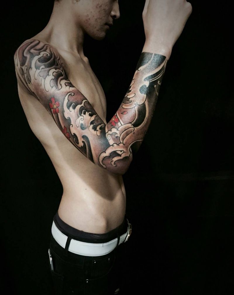 浪臂纹身图片