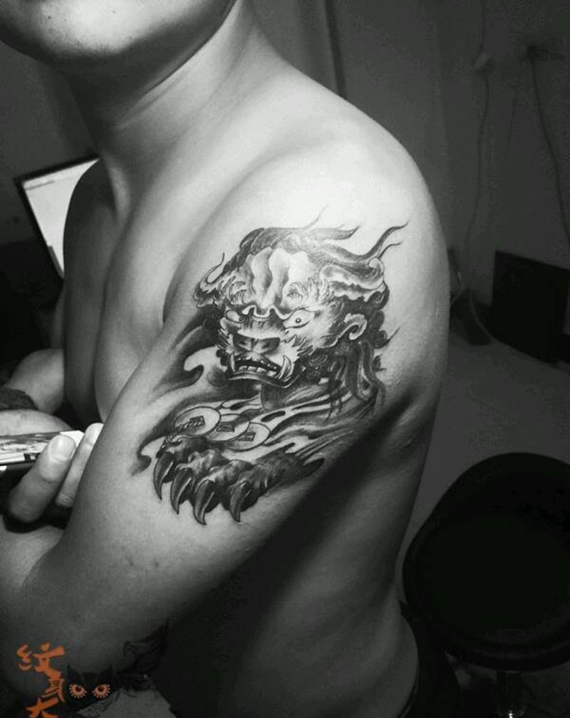 大臂福狮纹身图片_手臂传统动物鬼神纹身图案