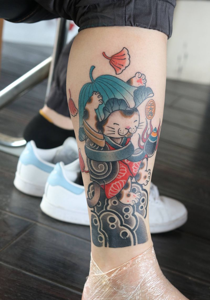 遮盖字母纹身图片_腿部老传统猫招财猫纹身图案