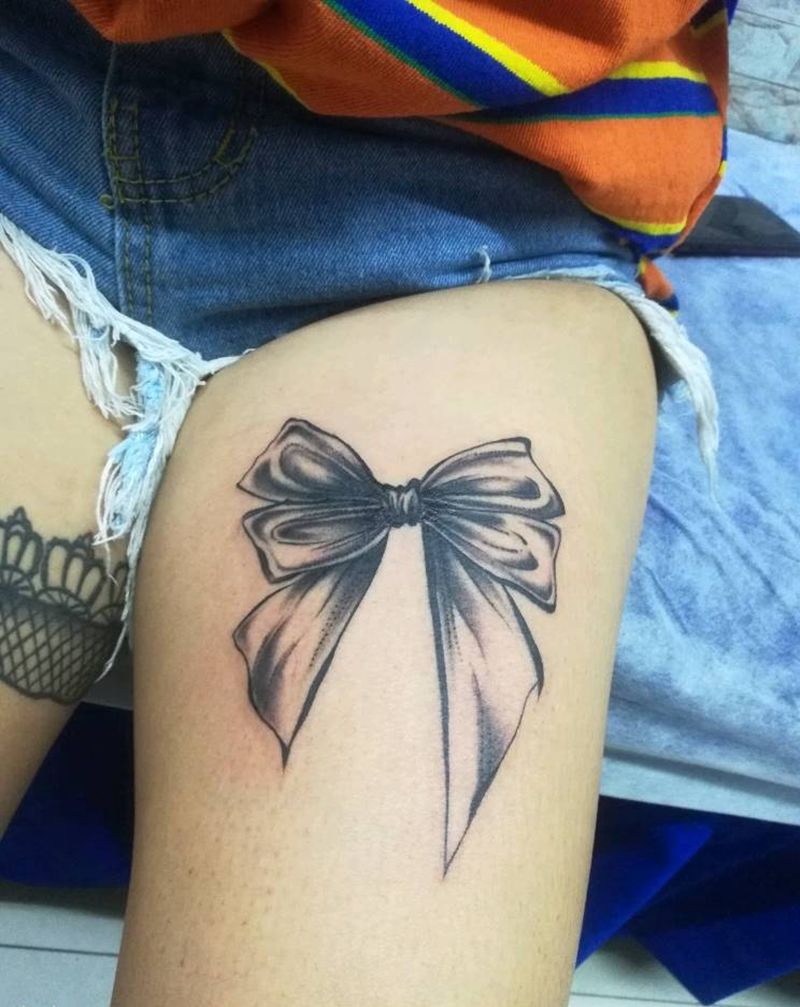 蝴蝶结纹身图片_腿部新传统纹身图案