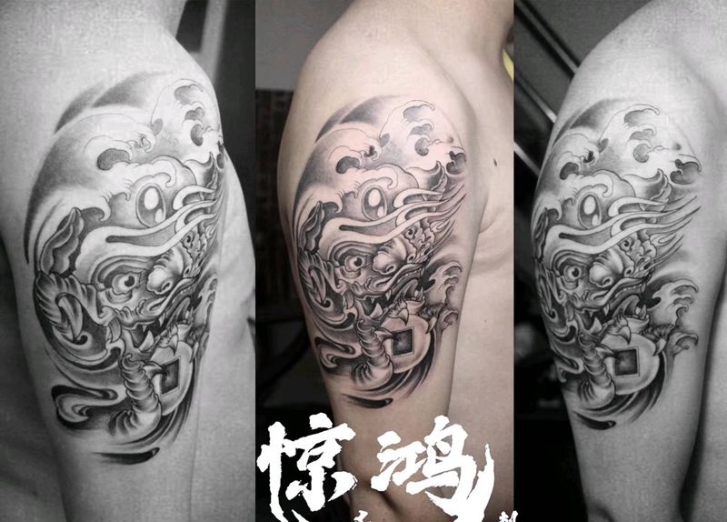 招财福狮纹身图片_手臂纹身图案