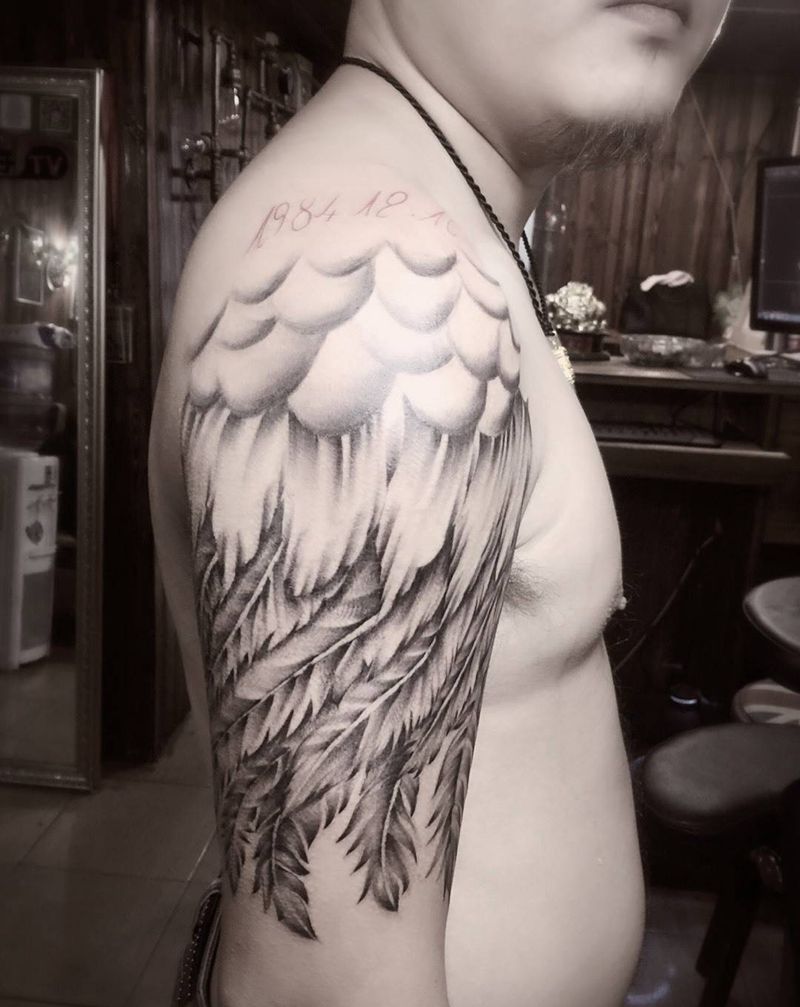 大臂翅膀纹身图片