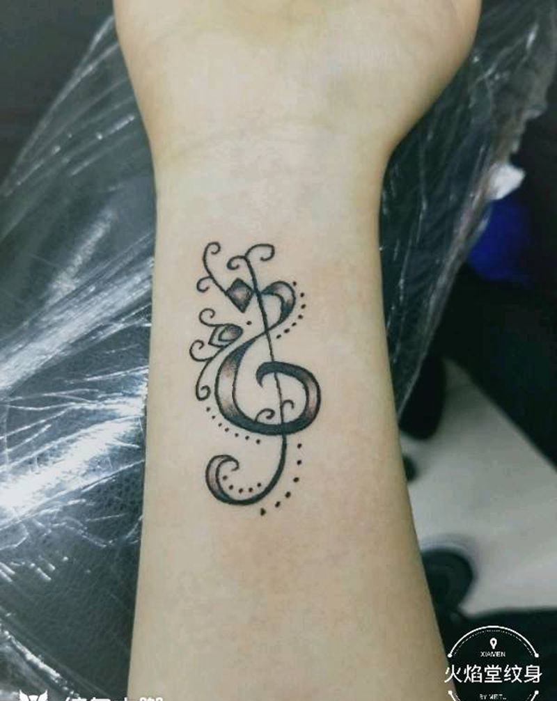 个性音符纹身图片_手部新传统纹身图案