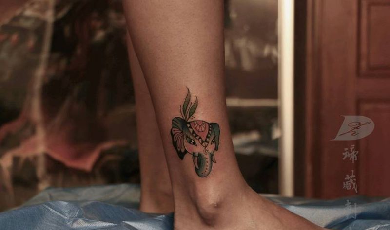 象神纹身图片_腿部脚部老传统新传统象神纹身图案