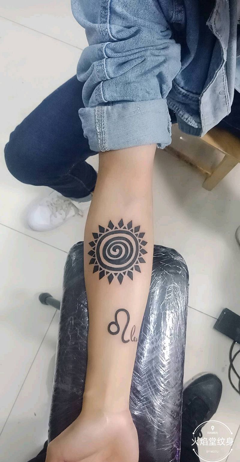 太阳图腾纹身图片_手臂新传统纹身图案