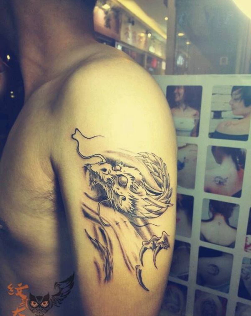 大臂龙纹身图片_手臂传统习俗动物原创纹身图案