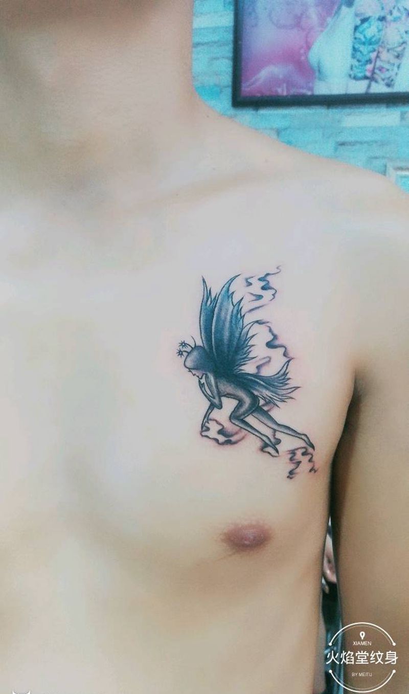 小精灵纹身图片_胸部新传统纹身图案
